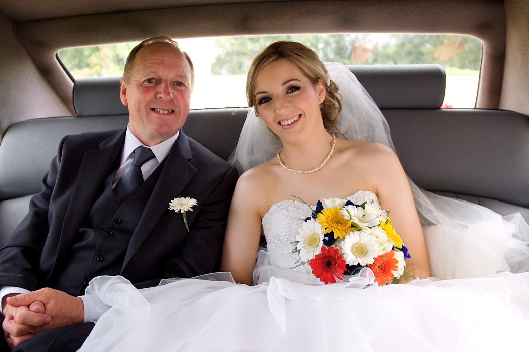 bride and father in wedding car